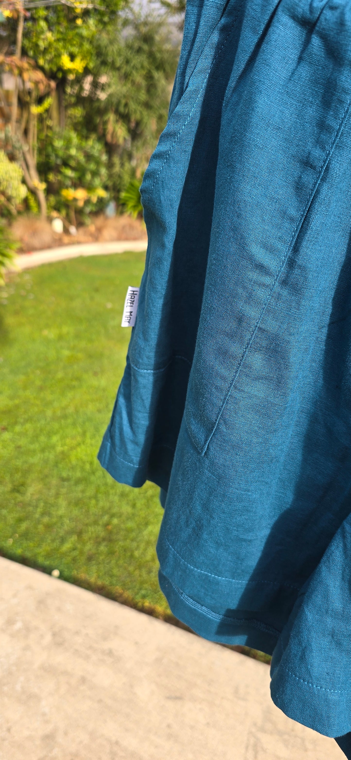 Linen shorts - Peacock