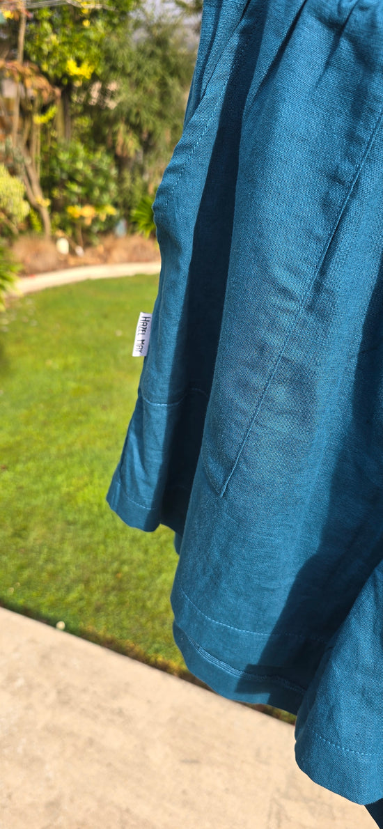 Linen shorts - Peacock